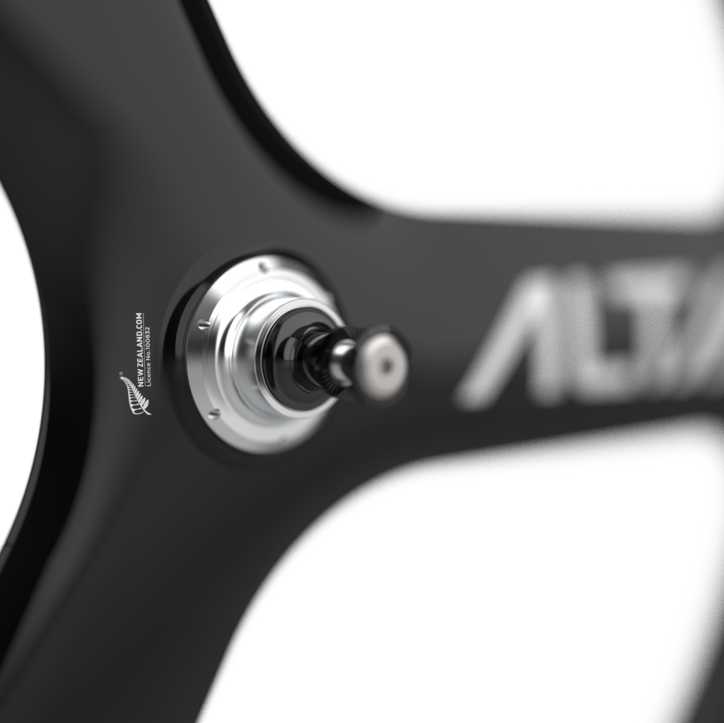 Close-up of a black tri spoke bicycle wheel rim with a silver hub and the brand name 'ALTIAS' visible on the spokes against a white background.