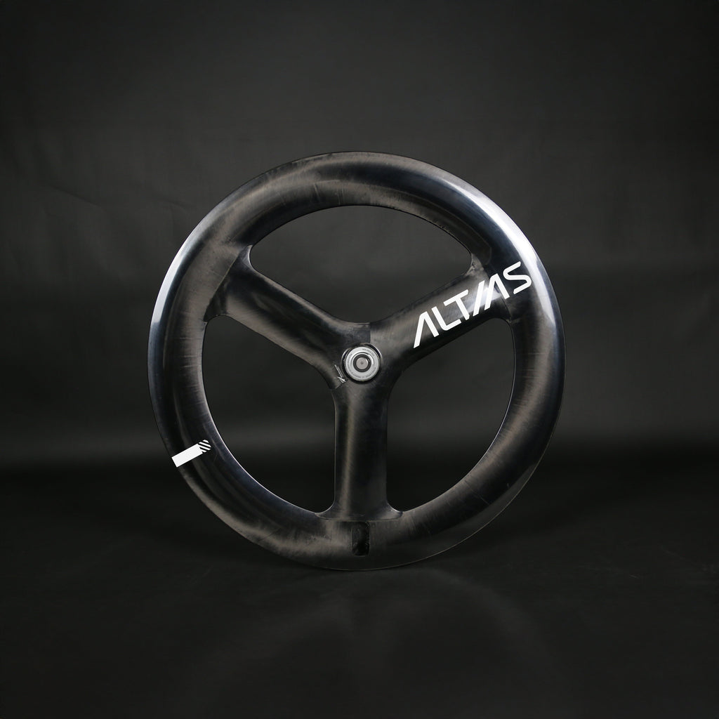 Black tri spoke track cycling wheel with 'ALTIAS' branding on a dark background